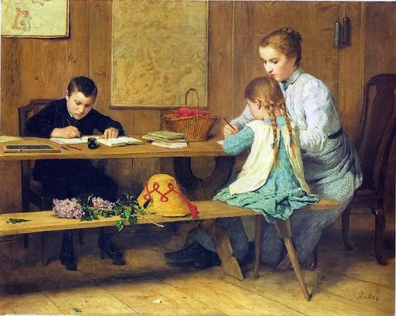 Mother and two children at a table